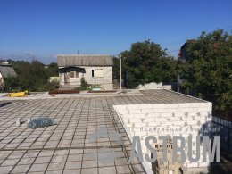 Бетонная стяжка на кровле дома