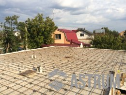 Бетонная стяжка на кровле дома