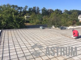 Бетонная стяжка на кровле дома