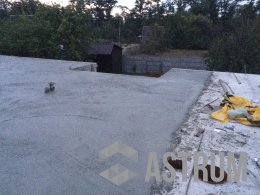 Бетонная стяжка на кровле дома