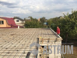 Бетонная стяжка на кровле дома