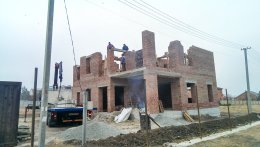 Кирпичная кладка дома